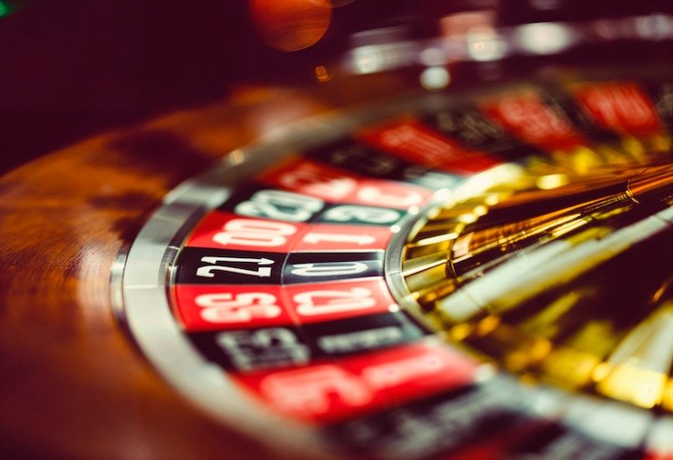 Dashboard promosi gren bet menampilkan struktur cashback mingguan dan tier loyalitas untuk Dragon Tiger Live